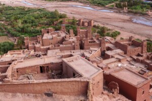 Kasbah of Ait Ben Haddou surrounded by palm trees, Morocco
