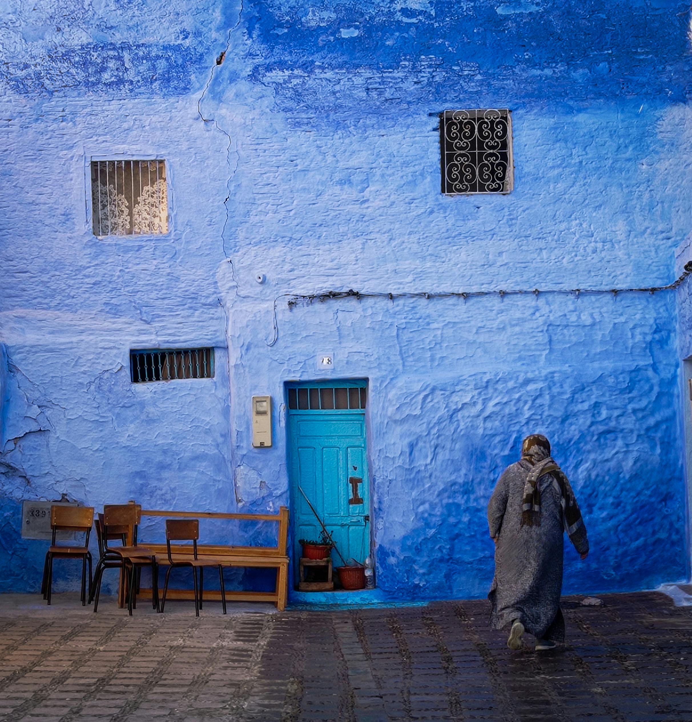 Blue-painted alleyway in Chefchaouen, Morocco