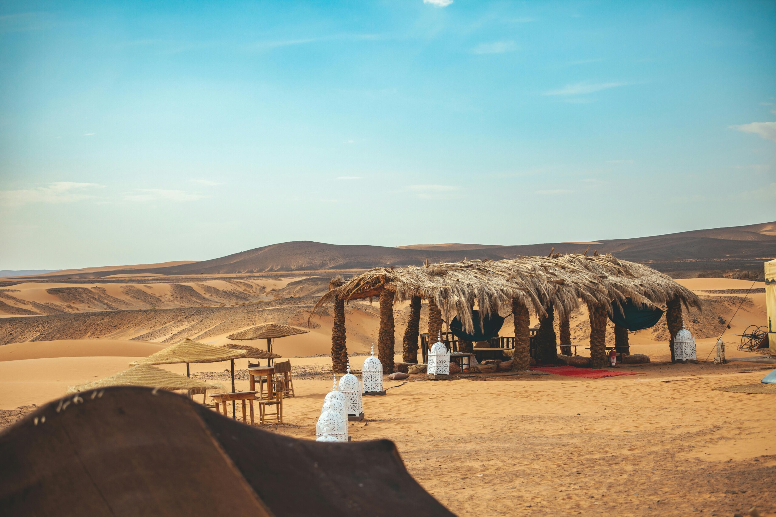 Luxury desert camp at sunset in Erg Chebbi, Merzouga, Morocco
