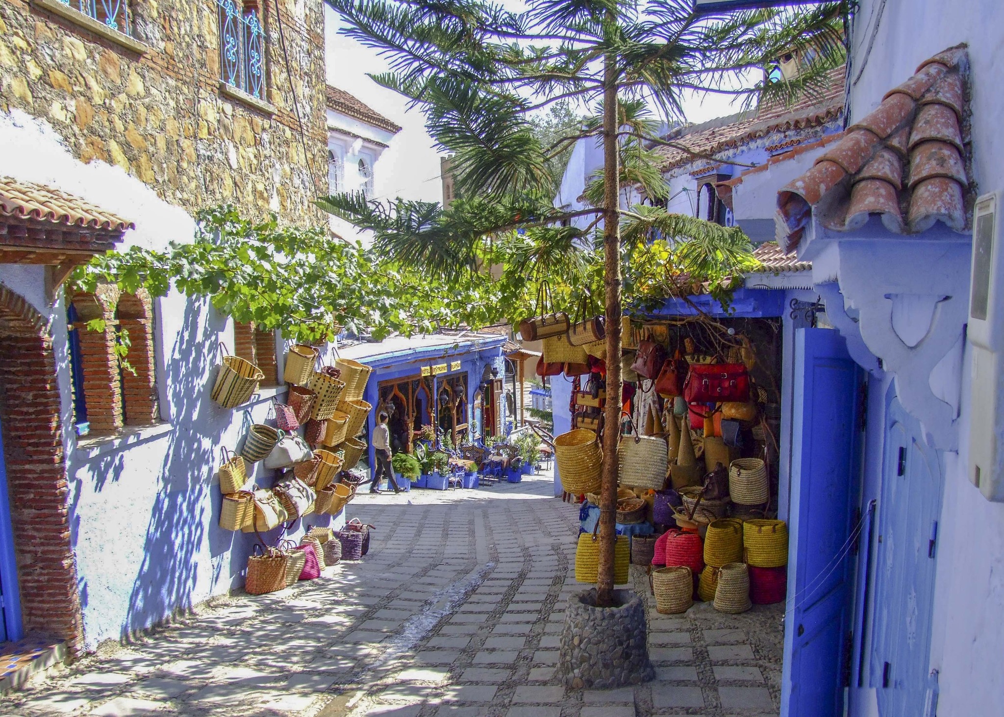 Blue-painted alleyway in Chefchaouen, Morocco