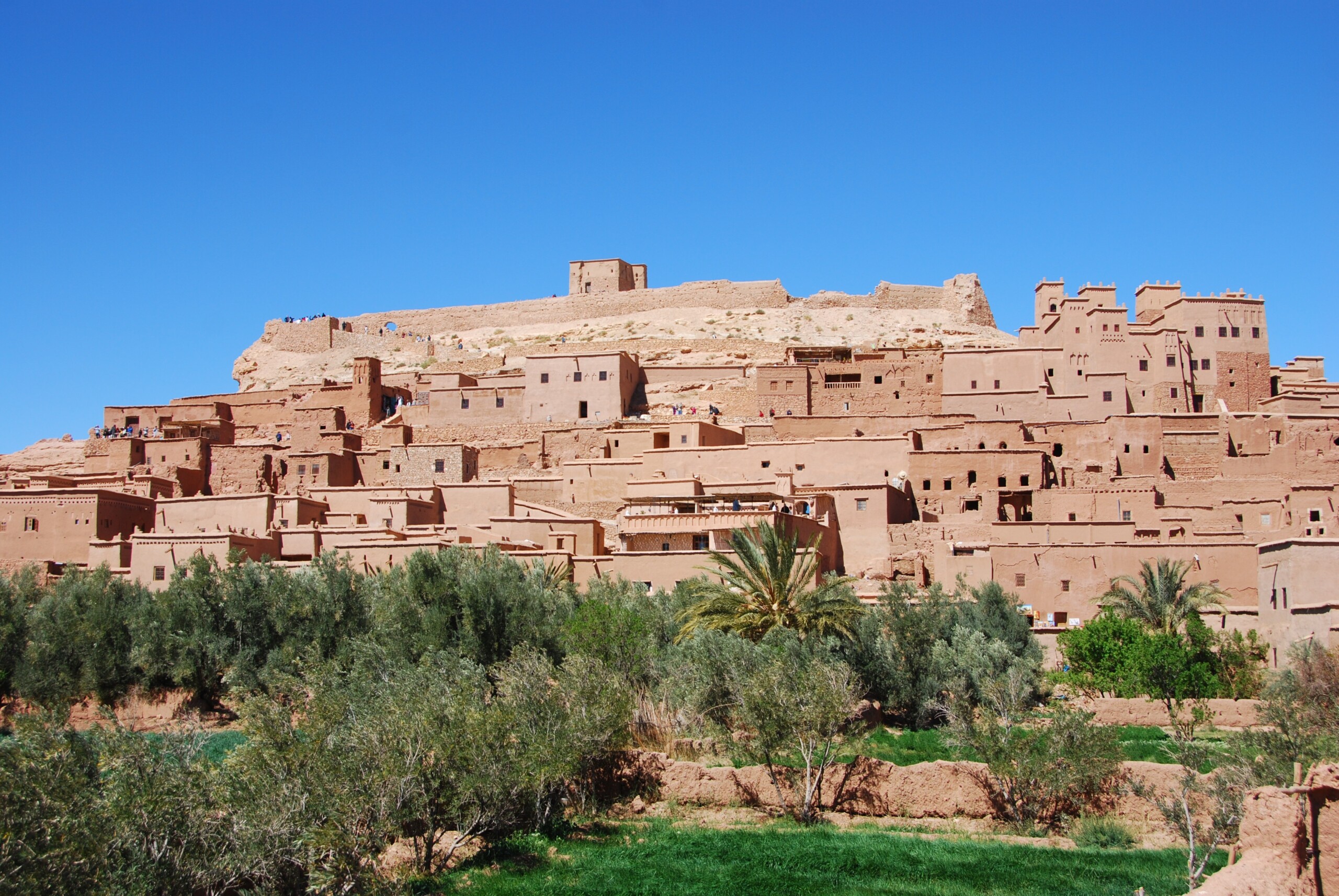 Kasbah of Ait Ben Haddou surrounded by palm trees, Morocco