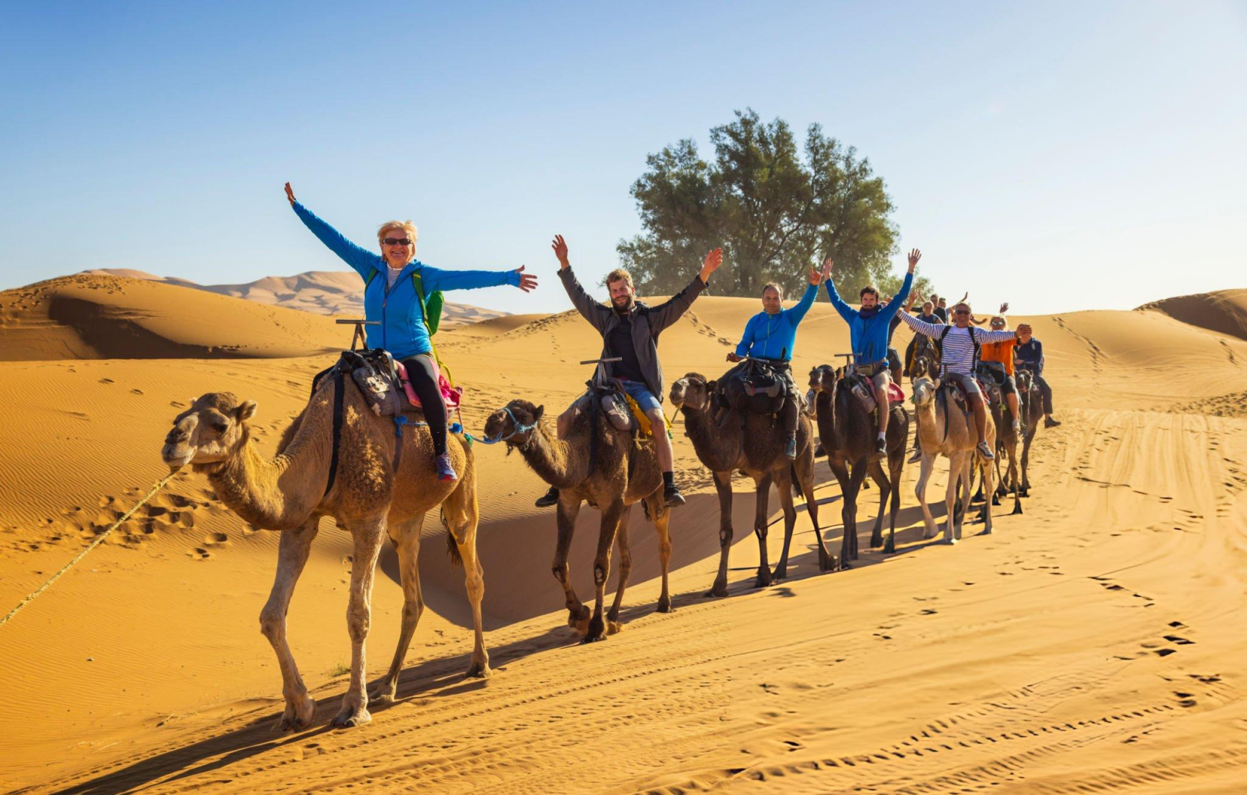 Seniors having a camel trek in Merzouga, Morocco